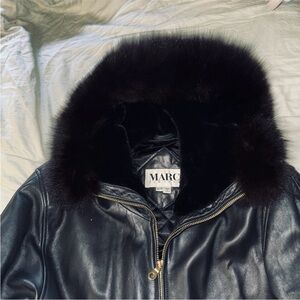 Oversized leather jacket with fur lined hood